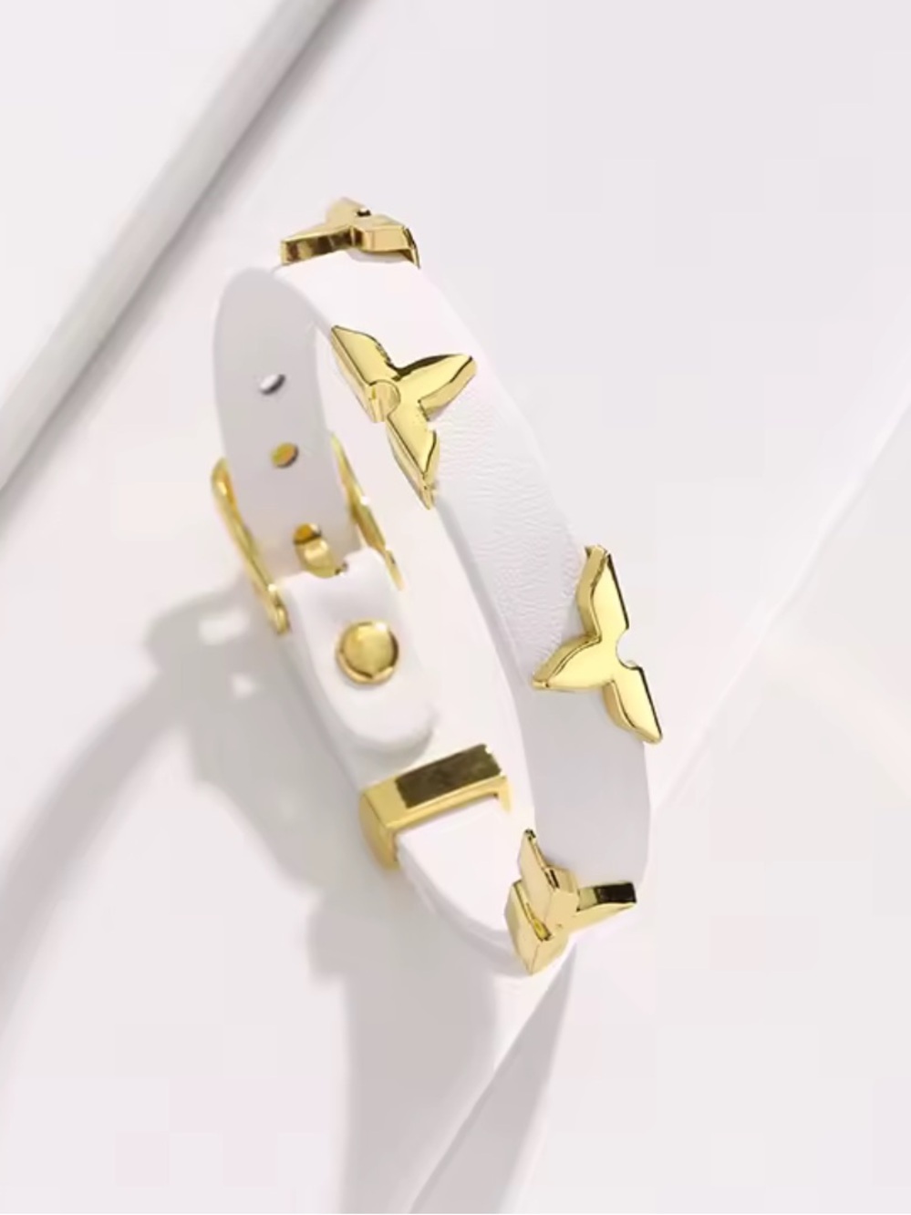 Modern White Leather Bracelet with Gold Butterfly Accents